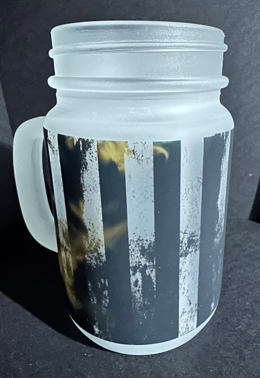 Black flag on fire mason jar