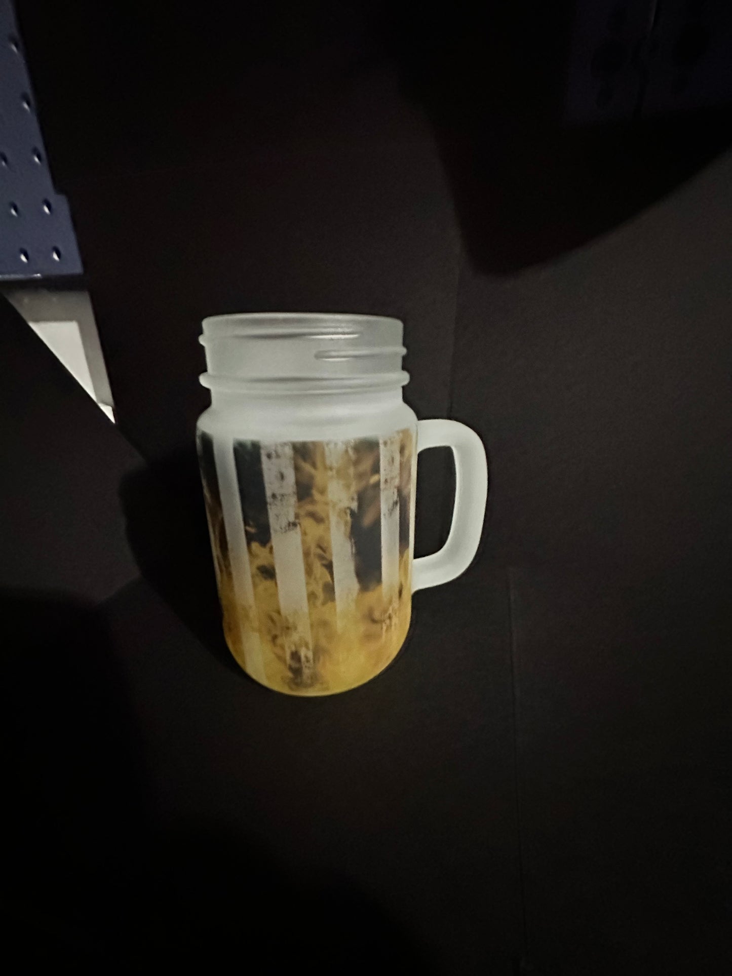 Black flag on fire mason jar